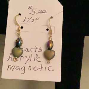 A pair of two tone pink and green earrings. The top beads are magnetic.